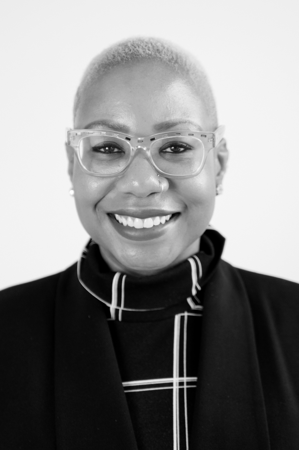 woman smiling in black and white
