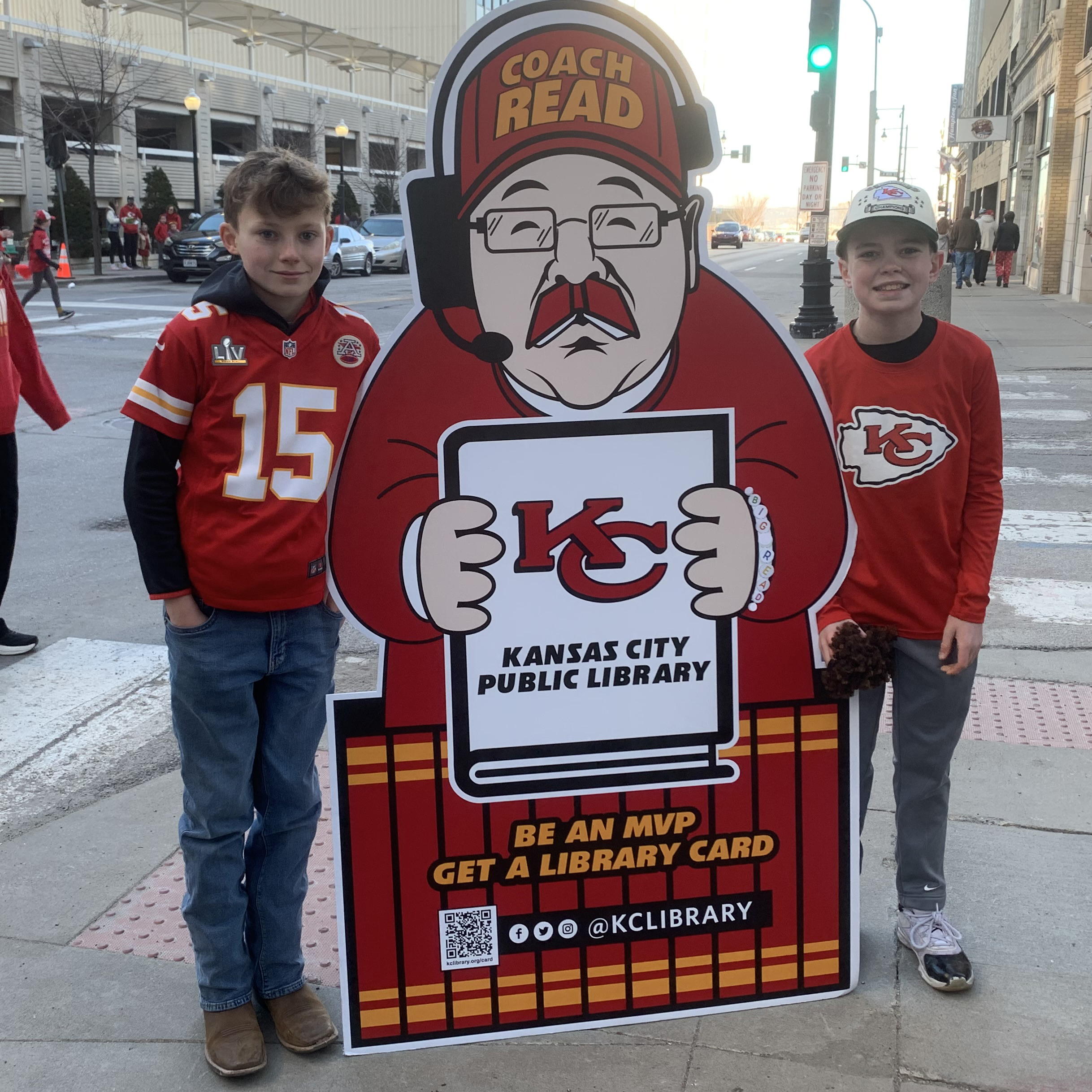 two children by cardboard cutout