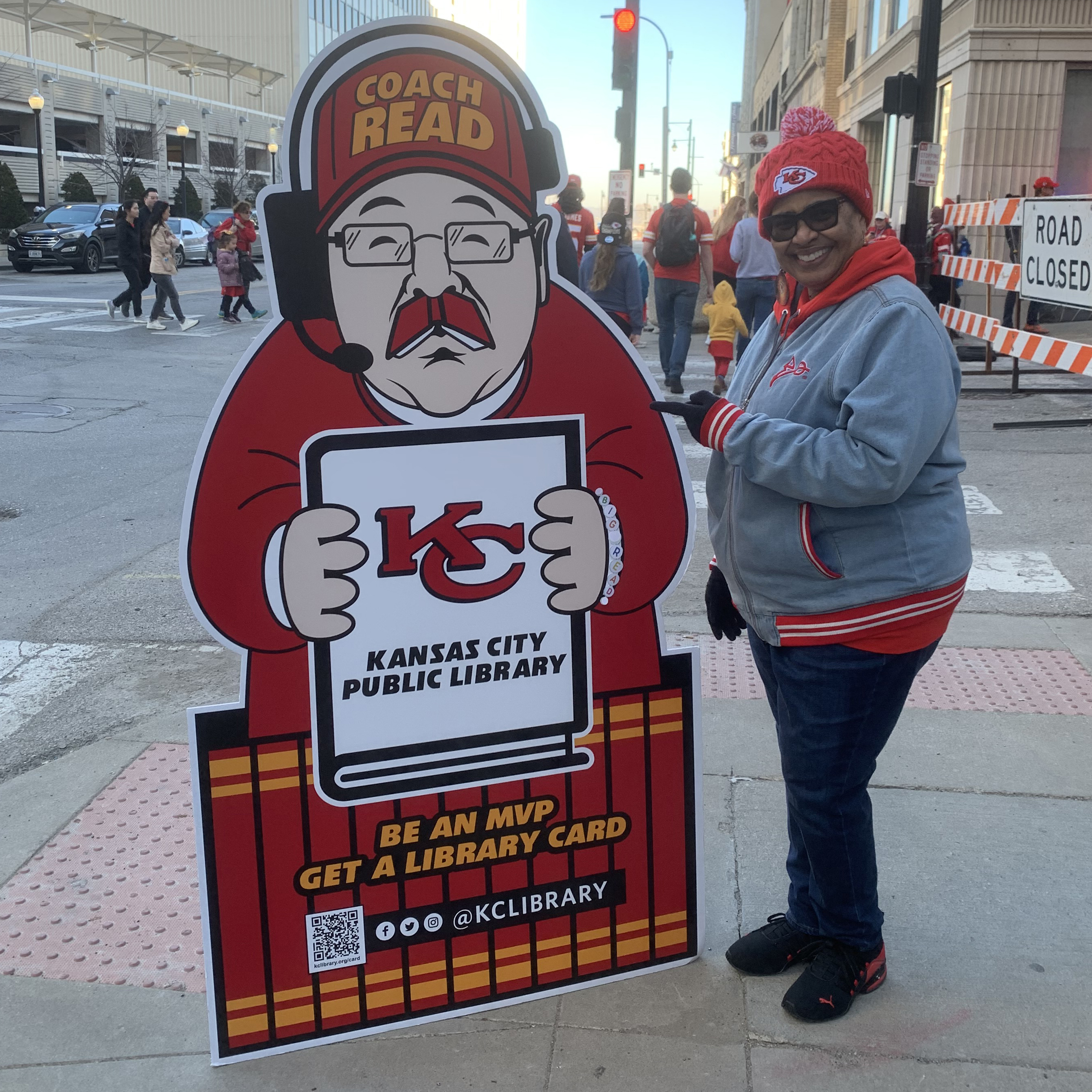 woman by cardboard cutout