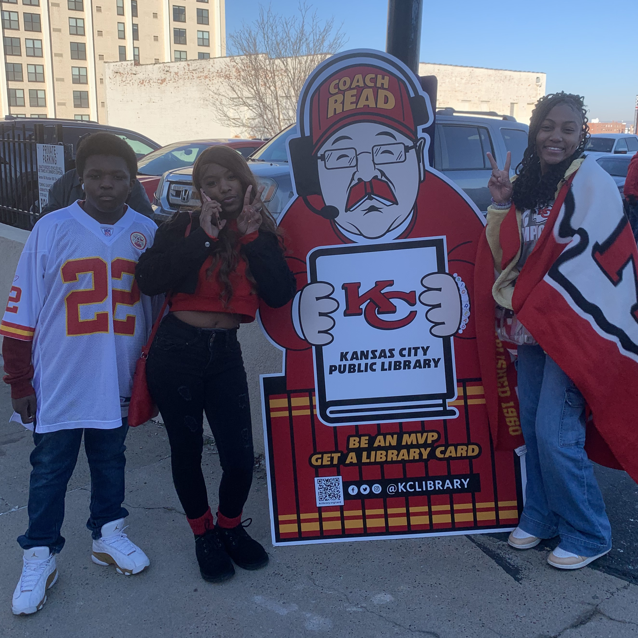 3 teens by cardboard cutout