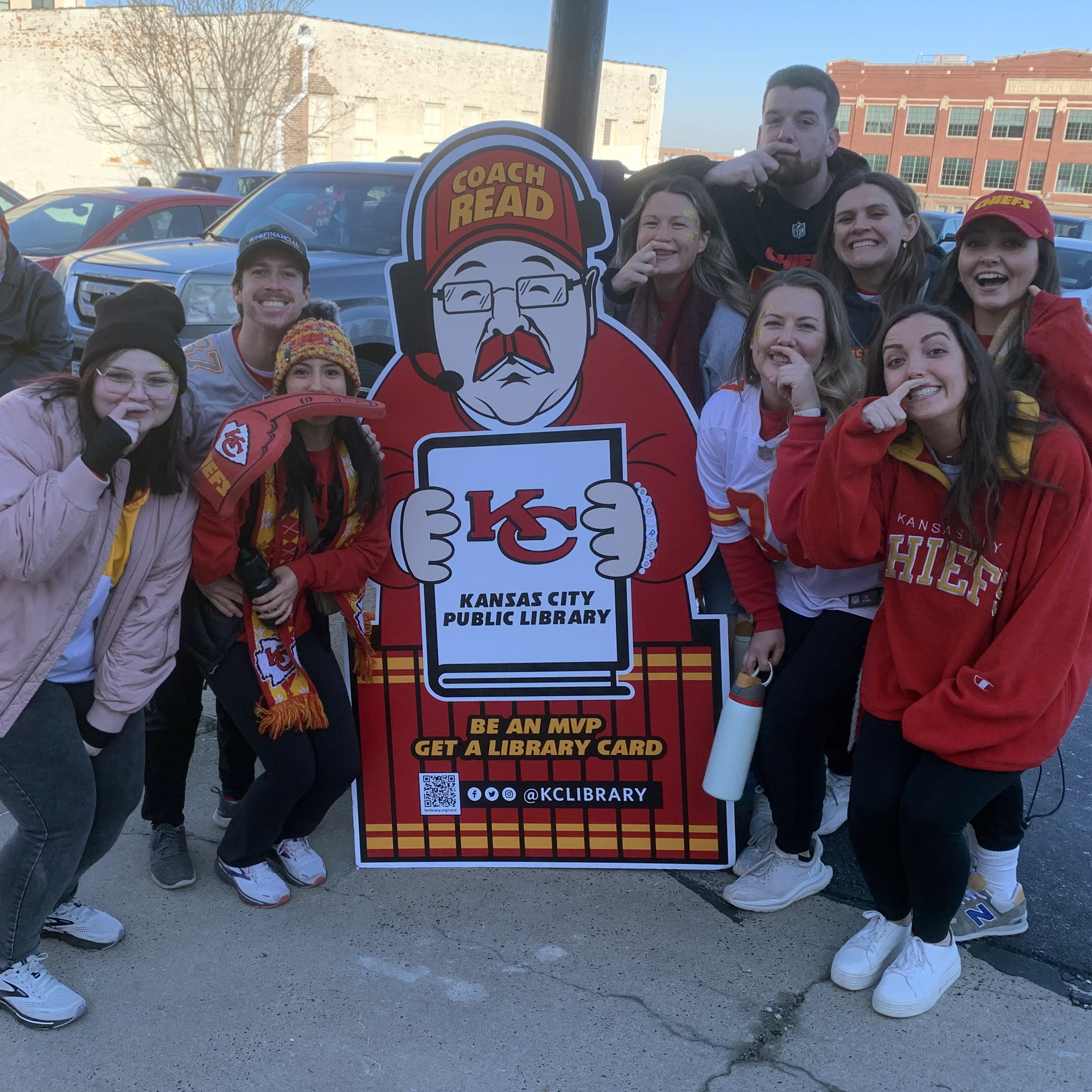 group making finger moustaches by cardboard cutout