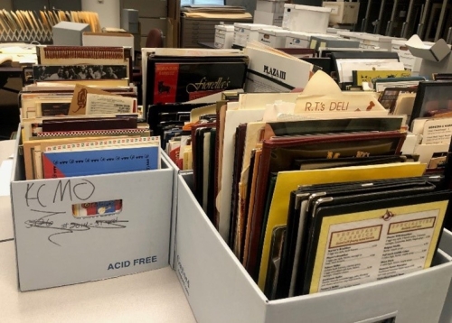 Boxes of menus with ties to Kansas City restaurants are waiting to be processed in Missouri Valley Special Collections.