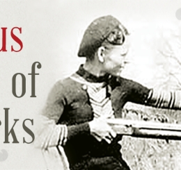 boy with gun and man