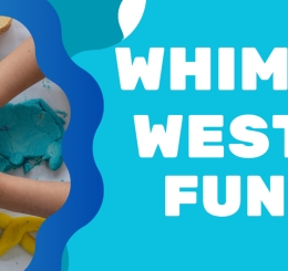 hands rolling out playdough