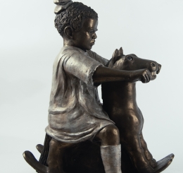 Child on Rocking Horse