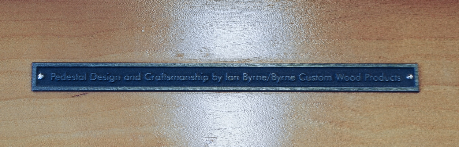 Child Reading on Pedestal detail