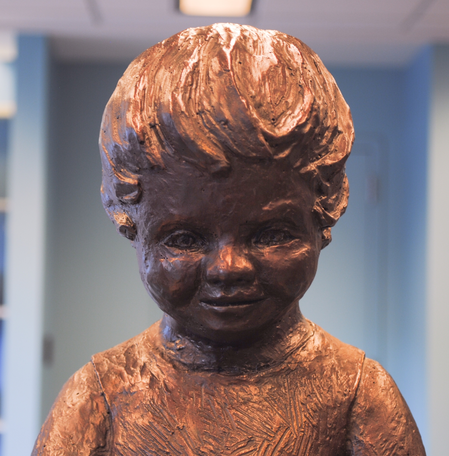 Child Reading on Pedestal detail