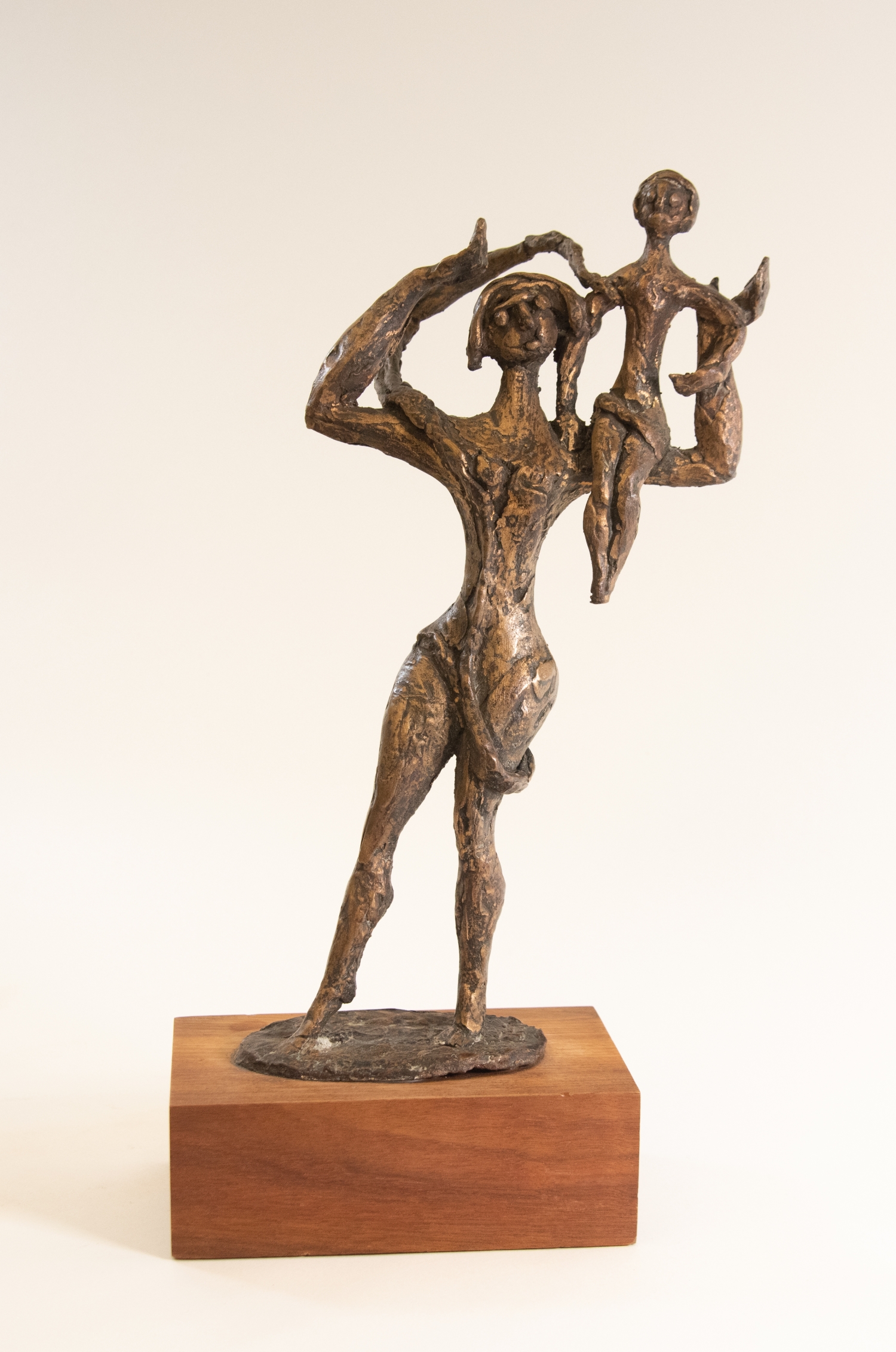 Mother Lifting Child