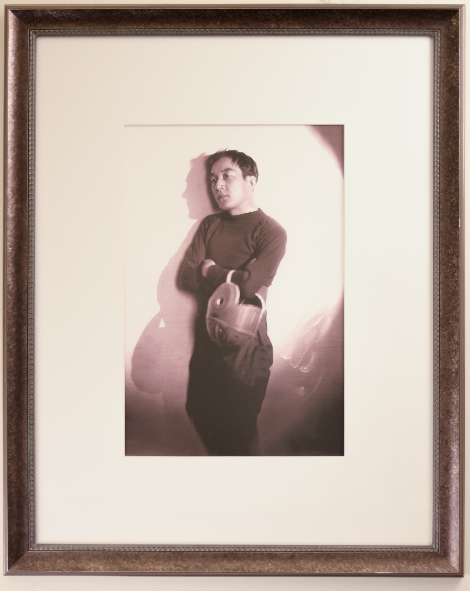 Portrait of Sessue Hayakawa Holding a Helmet