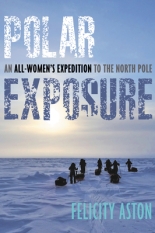 A group photo of the women expedition team heading off into an artic sunset