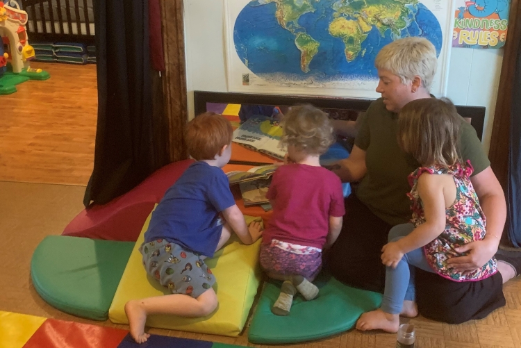 Children reading at Birdsall House.