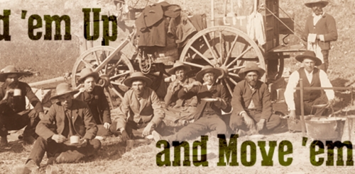 black and white photo of men by cart