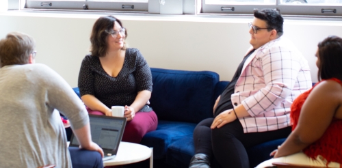 people sitting and conversing