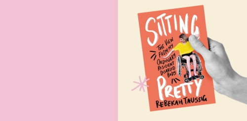 book cover held by black and white hand